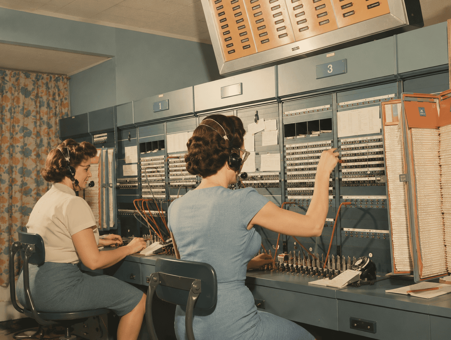 Vintage telephone operators at a switchboard